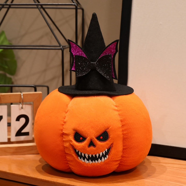 Plush pumpkin decoration figure with witch hat and embroidered spooky face