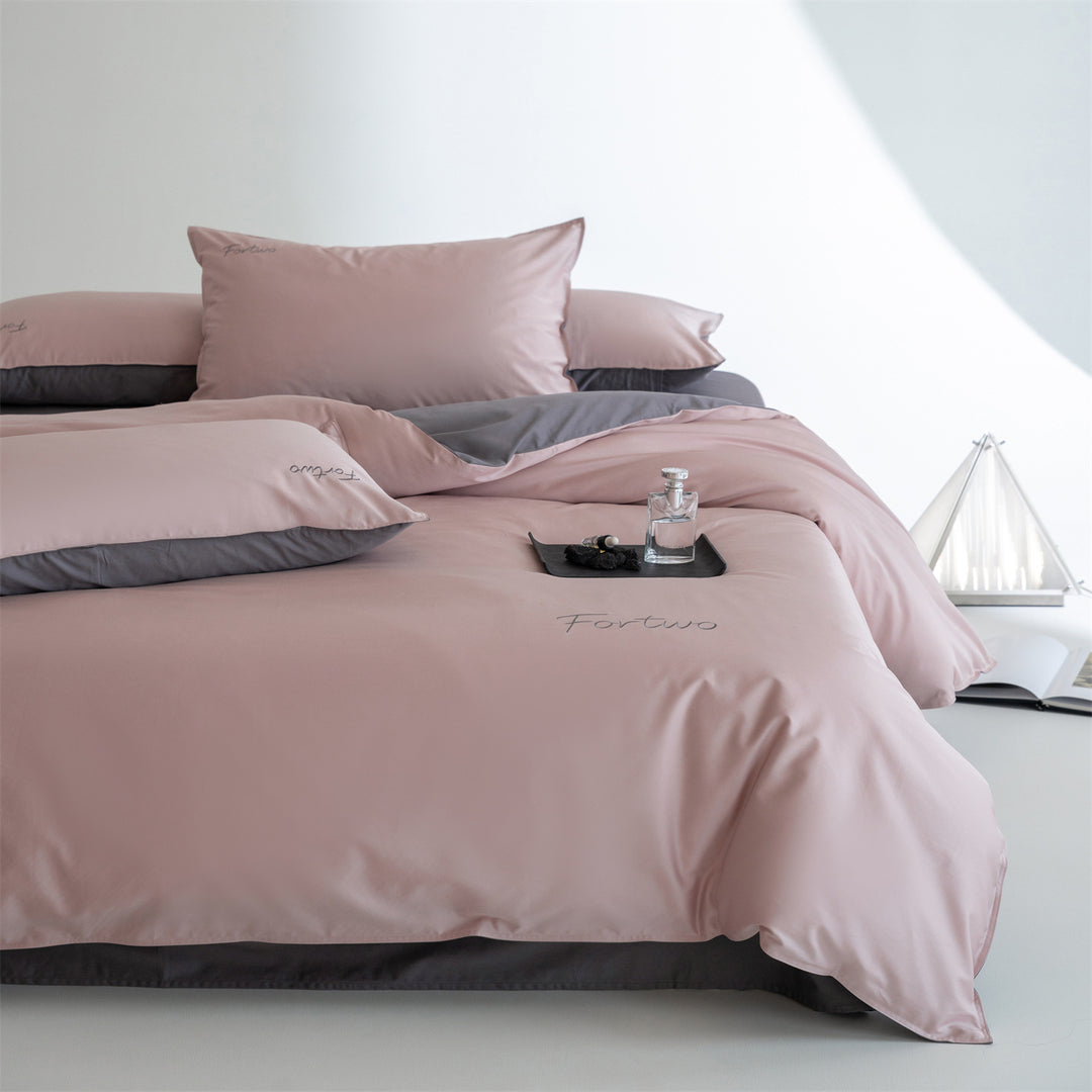 Reversible satin bedding set with fine tone-on-tone embroidery