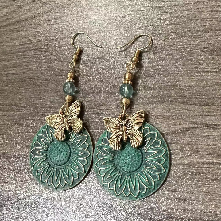 Elegant earrings with floral motif and butterflies Kalsten