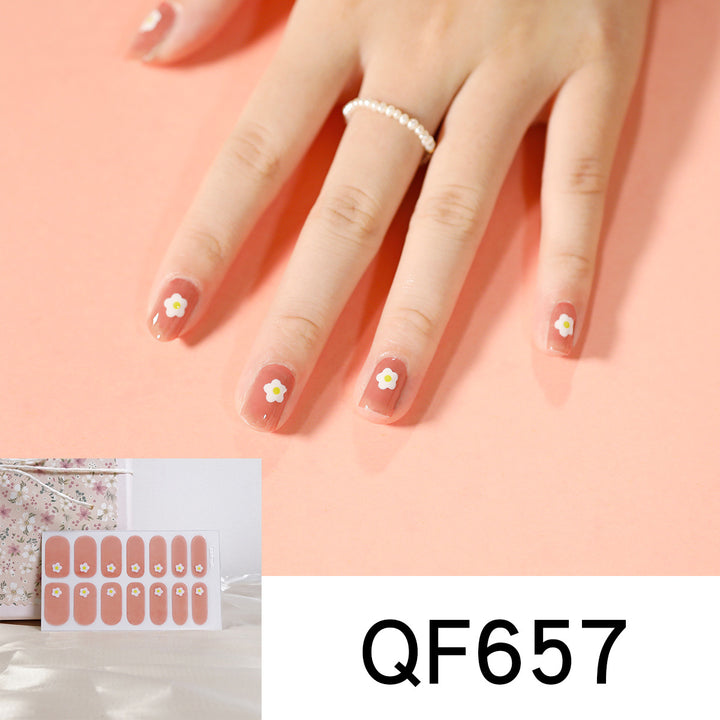Artificial nail art with heart-shaped designs and soft color gradients Kalsten