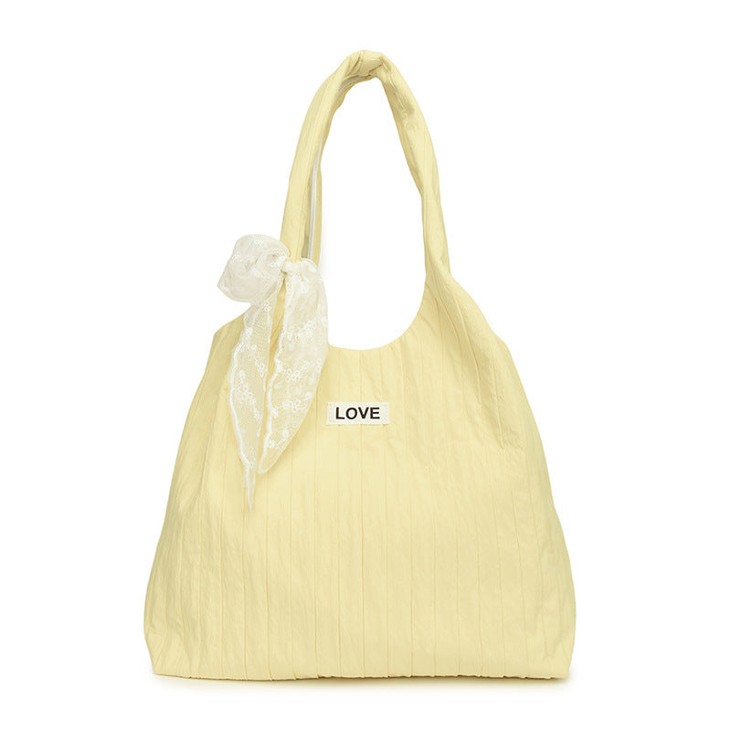 Leisure bag with structured design and playful scarf Kalsten