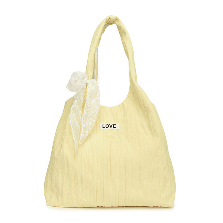 Leisure bag with structured design and playful scarf Kalsten