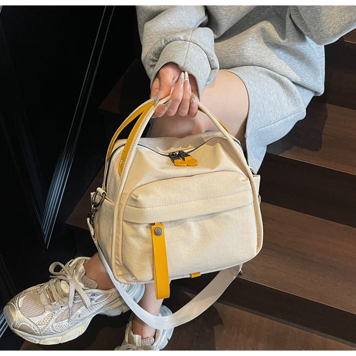 Fashionable shoulder bag with innovative structure and detachable carrying strap Kalsten