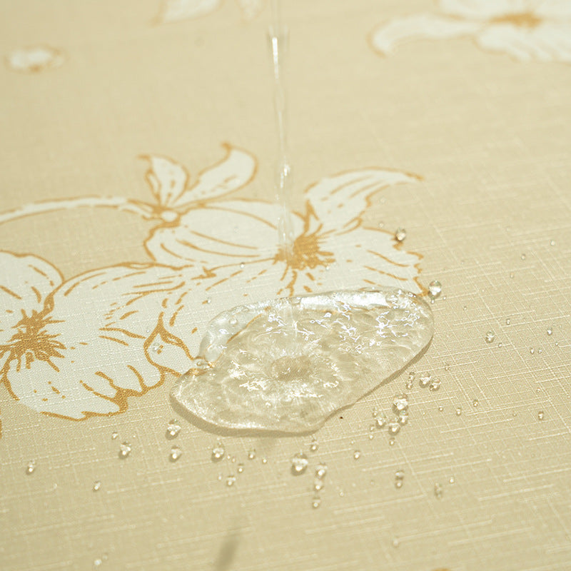 Round wipeable tablecloth with floral cut-out hem Kalsten