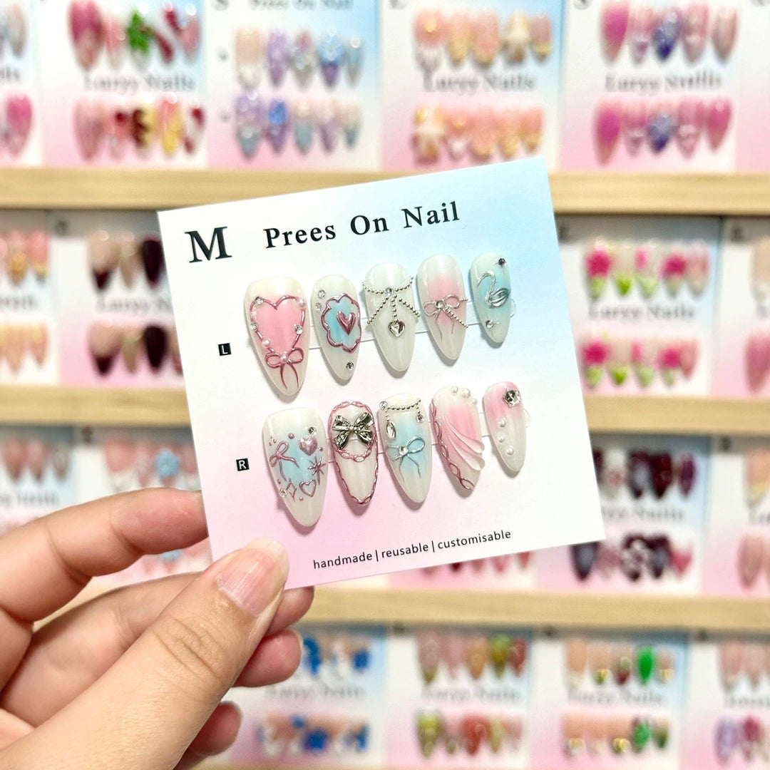 Artistic Press-On Nail Art Set with Heart and Bow Designs