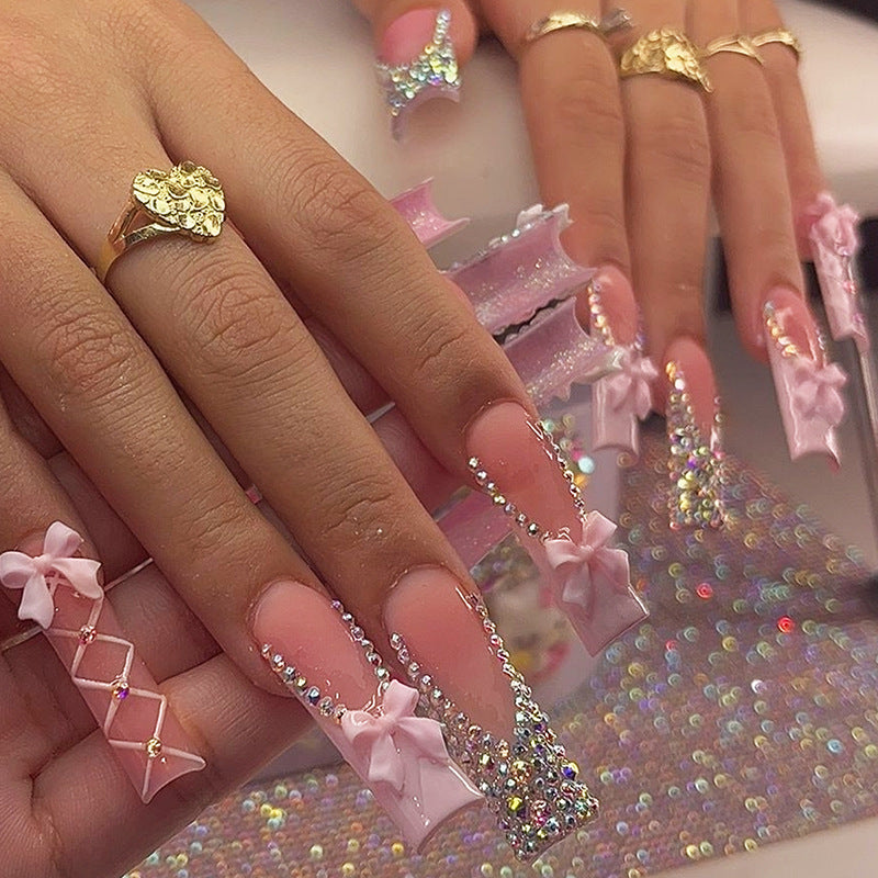 Artificial nail set with elegant bow and glitter accents Kalsten