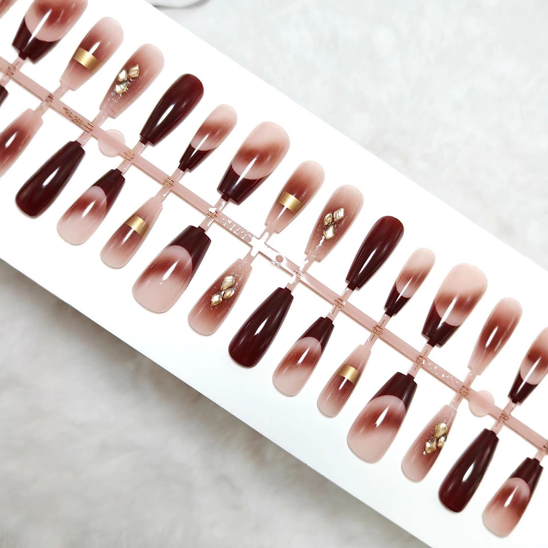 Artificial nails with elegant color gradients and jewelry details Kalsten