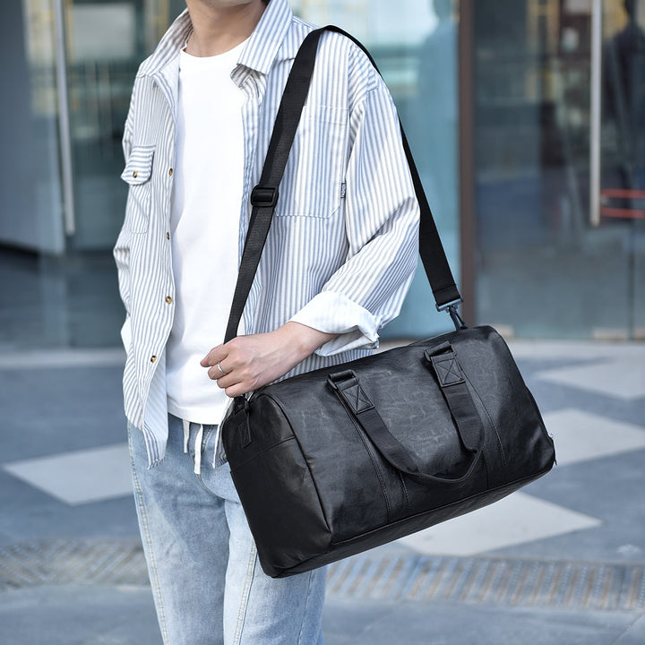 Travel bag made of high-quality leather with robust carrying handles Kalsten