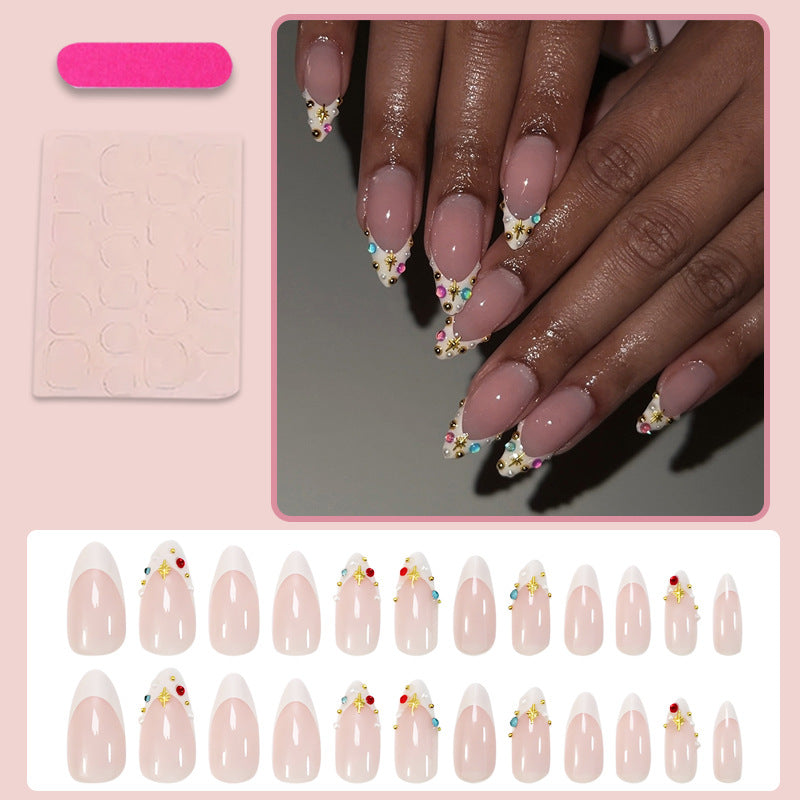 Acrylic nail set with glamorous embellishments and elegant accents Kalsten
