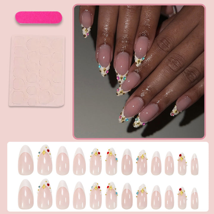 Acrylic nail set with glamorous embellishments and elegant accents Kalsten