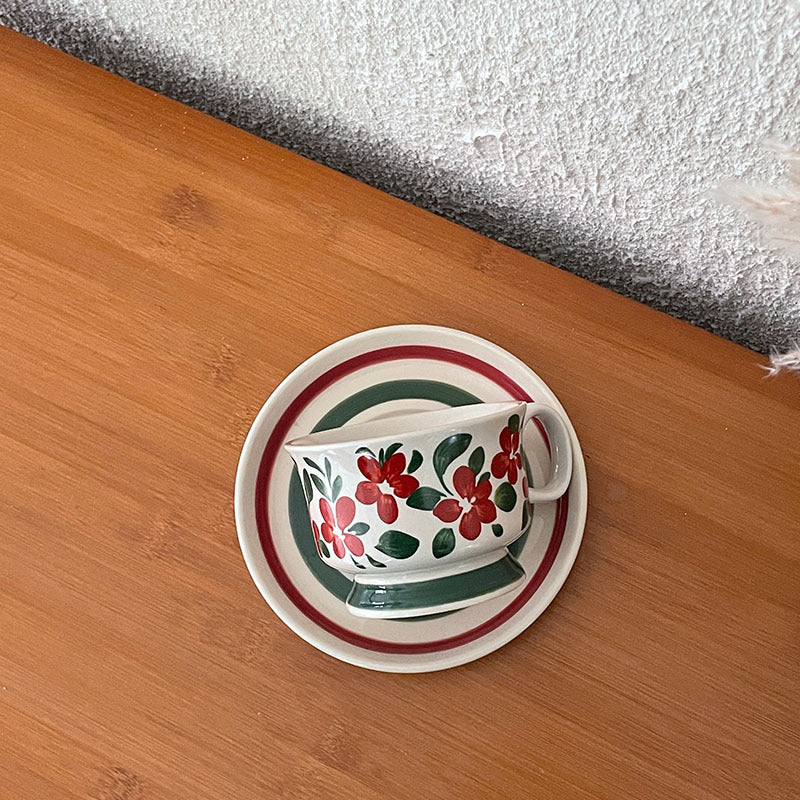 Ceramic coffee cup set with saucer and hand-painted leaf ornament