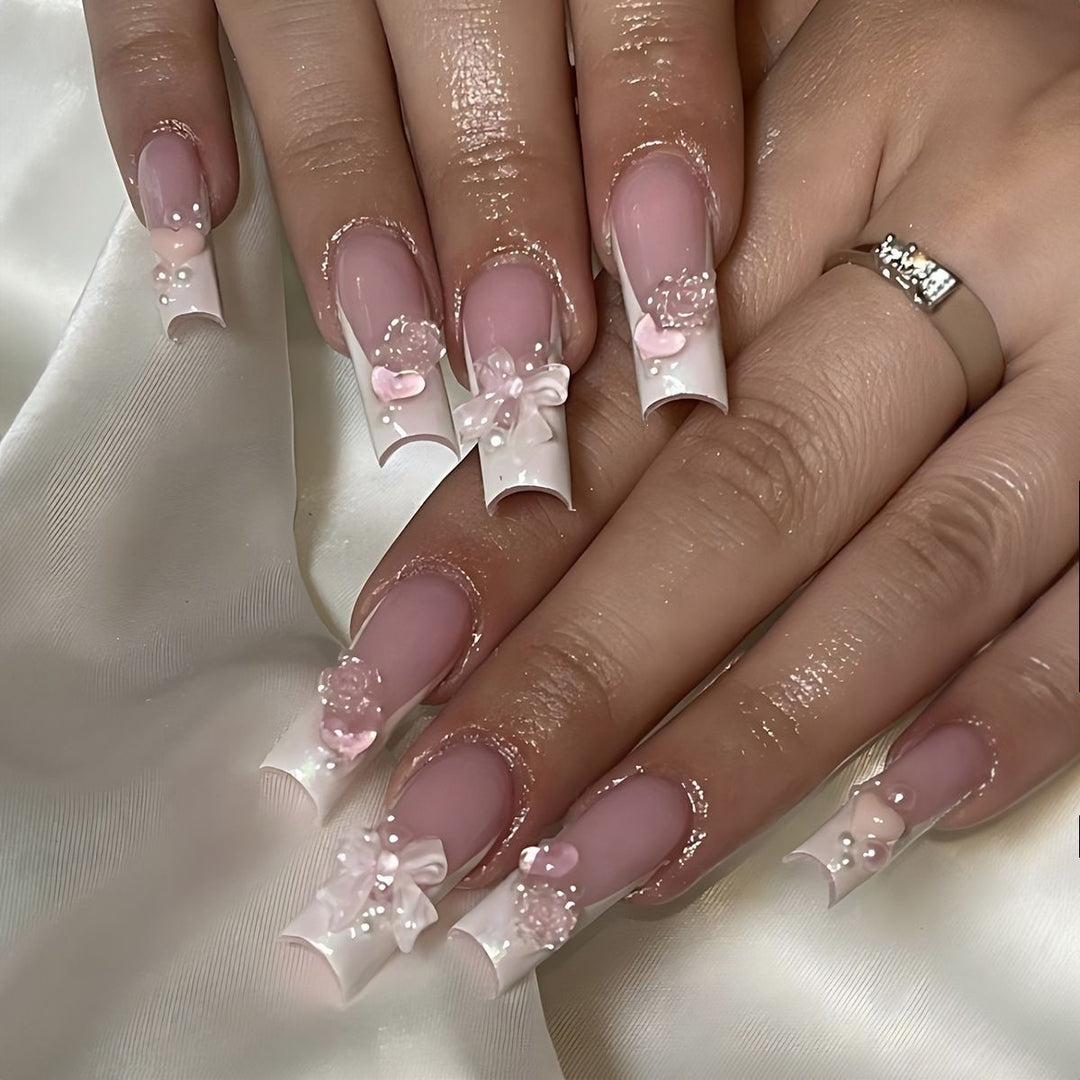Creative acrylic nail set with delicate pearl and gloss accents Kalsten