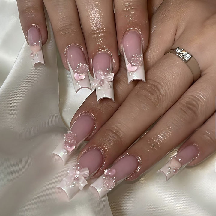 Creative acrylic nail set with delicate pearl and gloss accents Kalsten