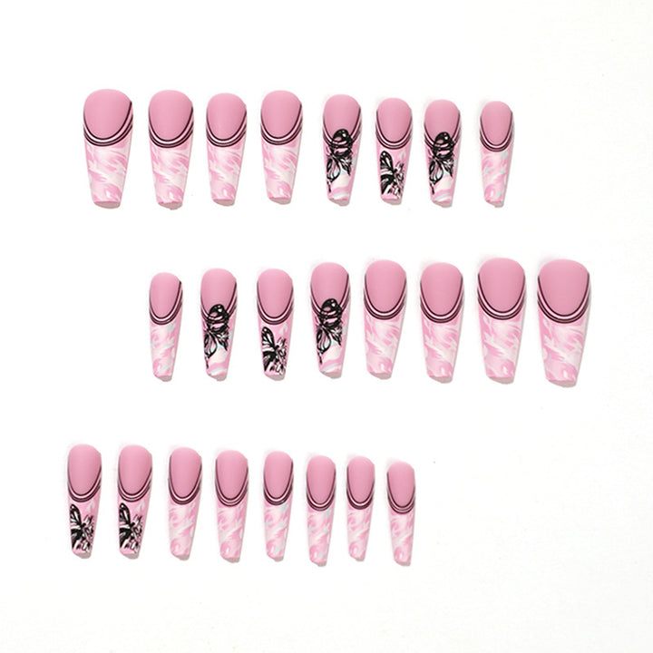Artificial nail art with delicate butterfly designs Kalsten