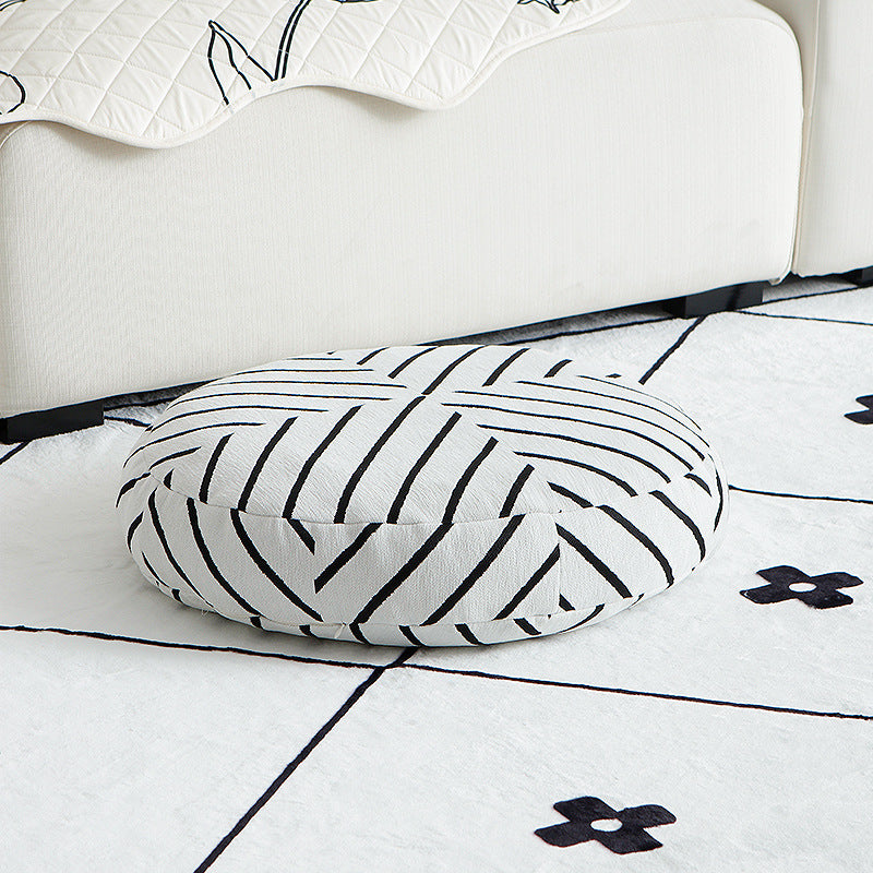 Round decorative seat cushion with floral jacquard structure