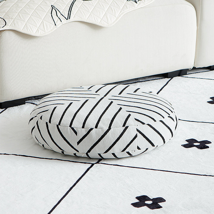 Round decorative seat cushion with floral jacquard structure