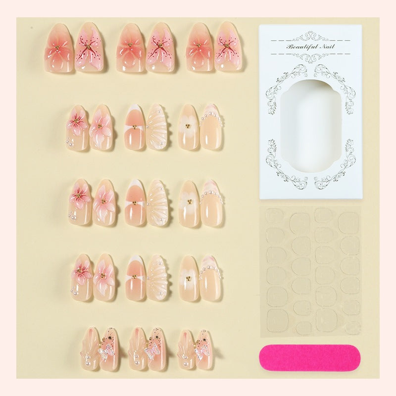 Creative nail art set with delicate flower and glitter embellishments Kalsten