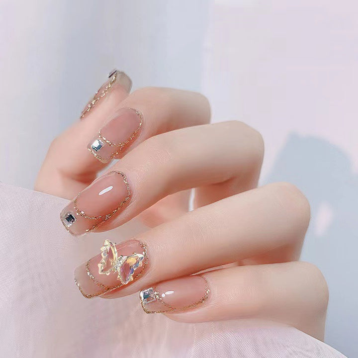 Glamorous artificial nails with delicate rhinestone decorations Kalsten