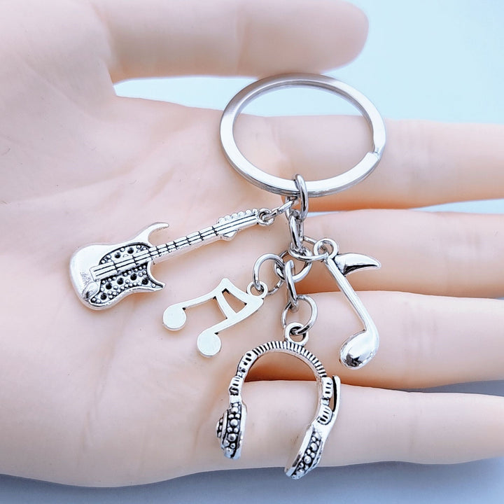 Keychain with musical instruments motifs Kalsten
