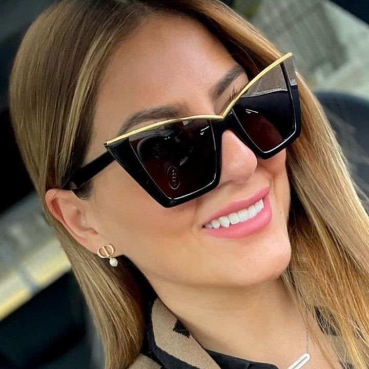 Women extravagant sunglasses with unique design and golden accents Kalsten
