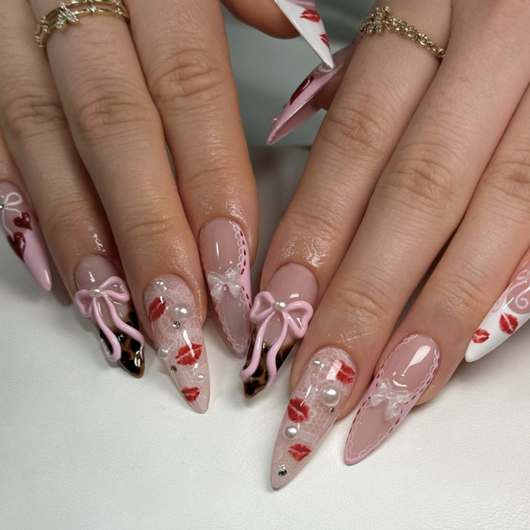 Artful Nail Art with Romantic Heart and Bow Motif Kalsten