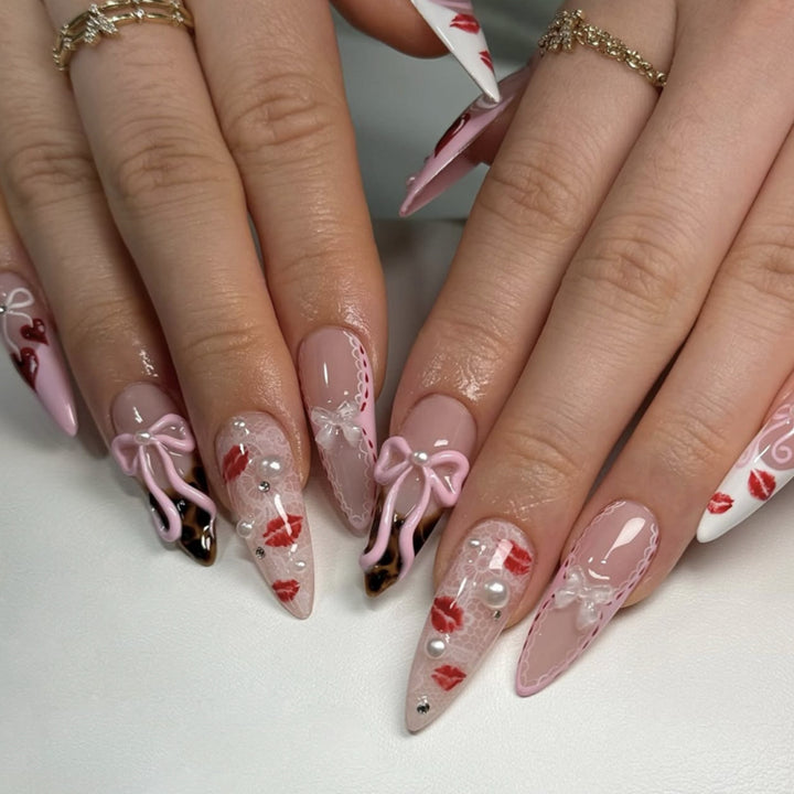 Artful Nail Art with Romantic Heart and Bow Motif Kalsten