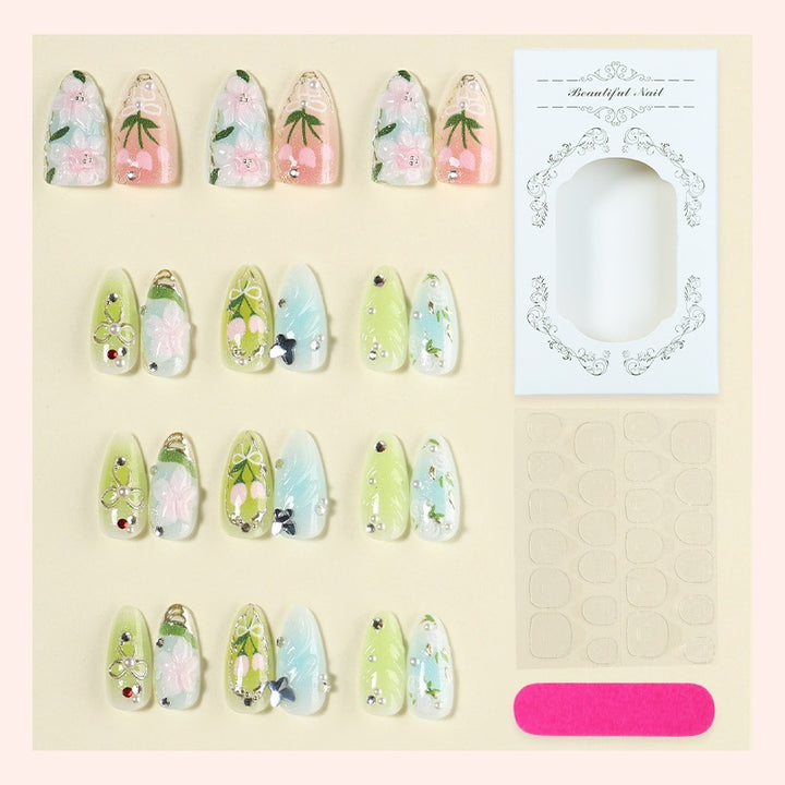 Artificial nail set with floral motifs and glitter accents Kalsten