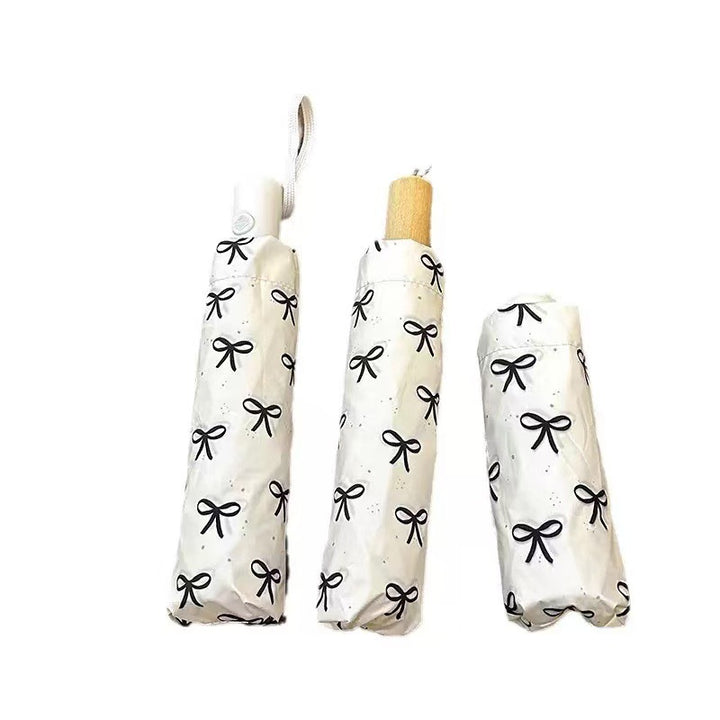 Women's foldable umbrella with elegant bow design Kalsten