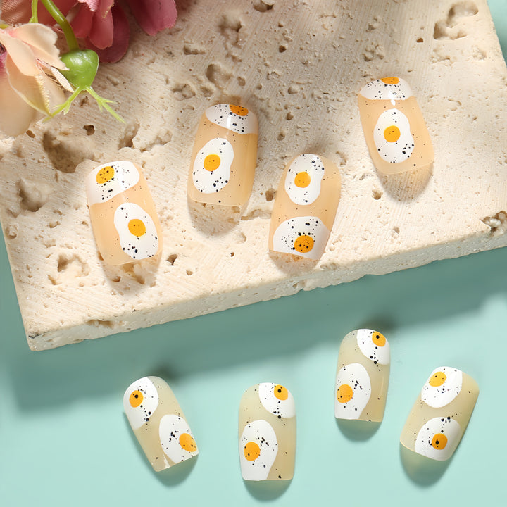 Artificial nails in creative fried egg design Kalsten
