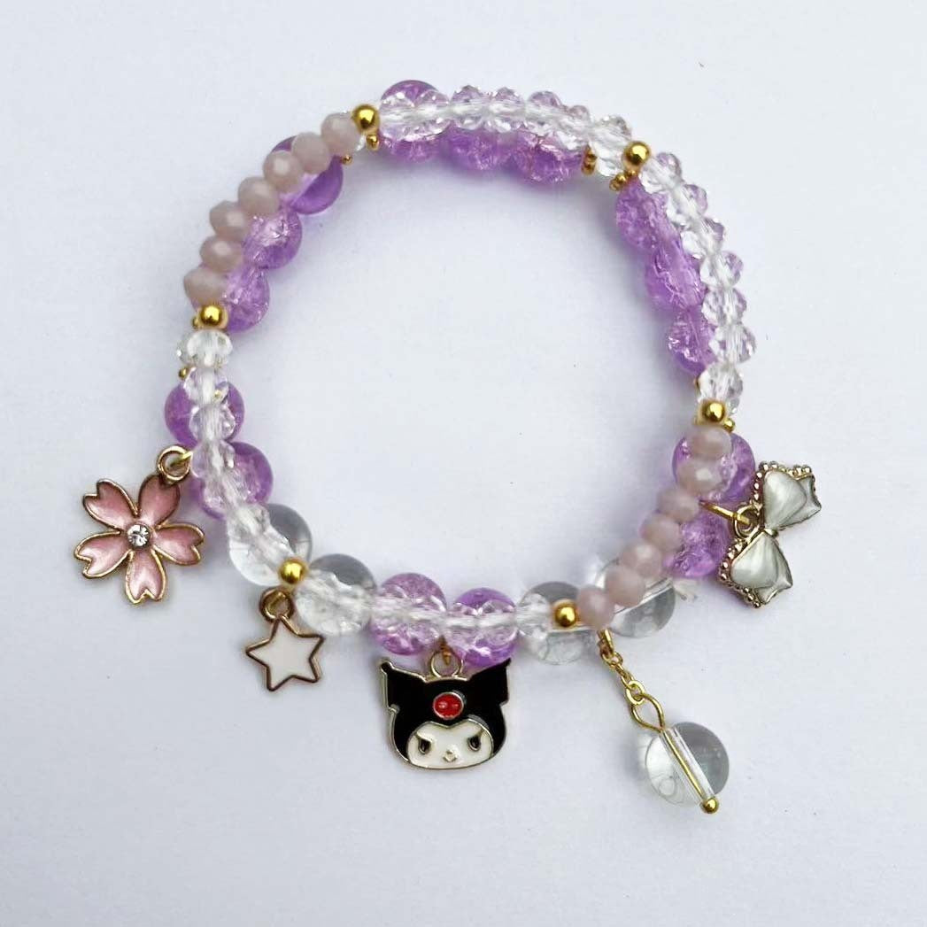 Elegant bracelet with animal and glitter pendants Kalsten