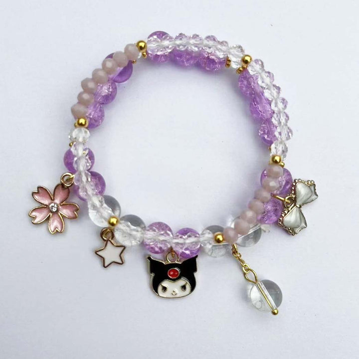 Elegant bracelet with animal and glitter pendants Kalsten