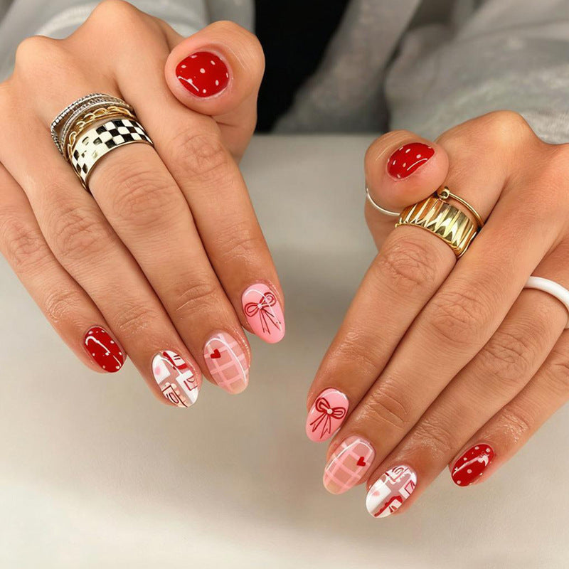 Artificial nail set with charming heart and bow patterns Kalsten