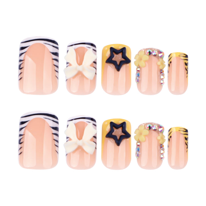 Artistic Nail Art with Glitter and Floral Accents Kalsten