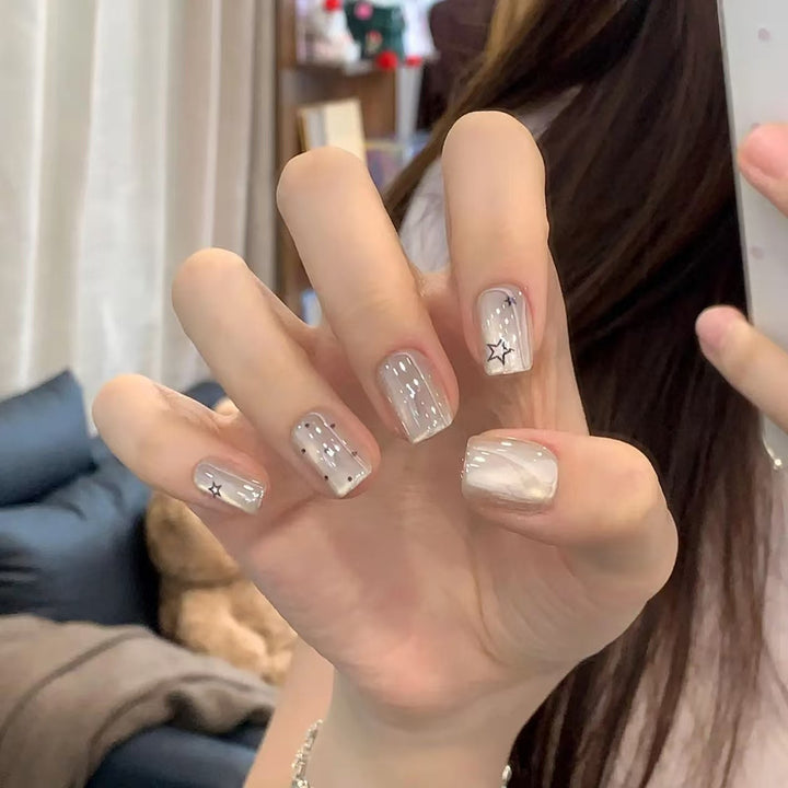 Artistic Star-Design Nail Extensions
