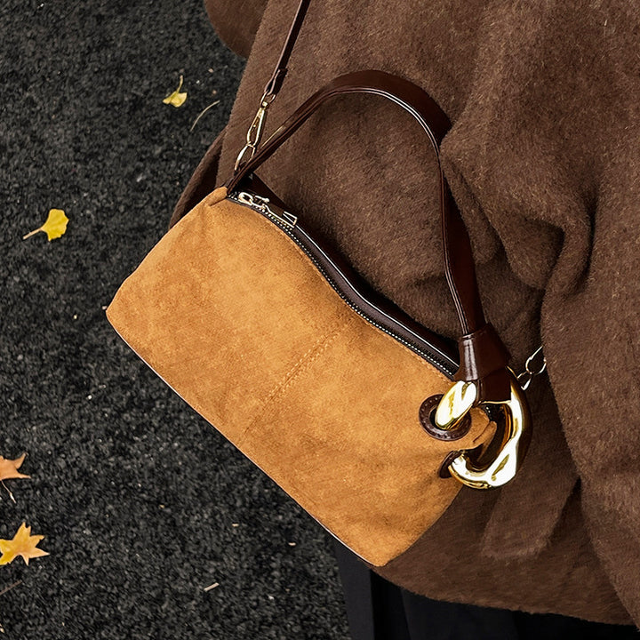 Elegant Suede Handbag with Gold Accents