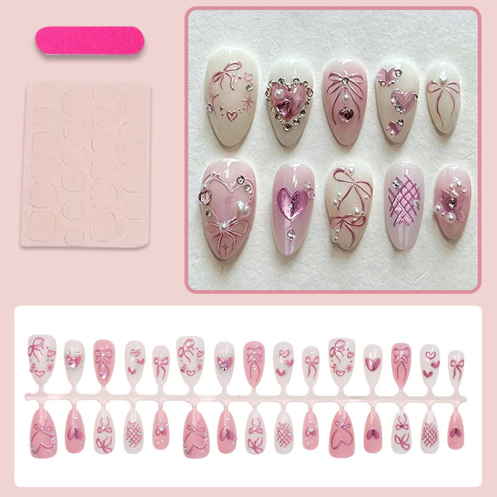 Artificial nail set with romantic bow and heart designs Kalsten