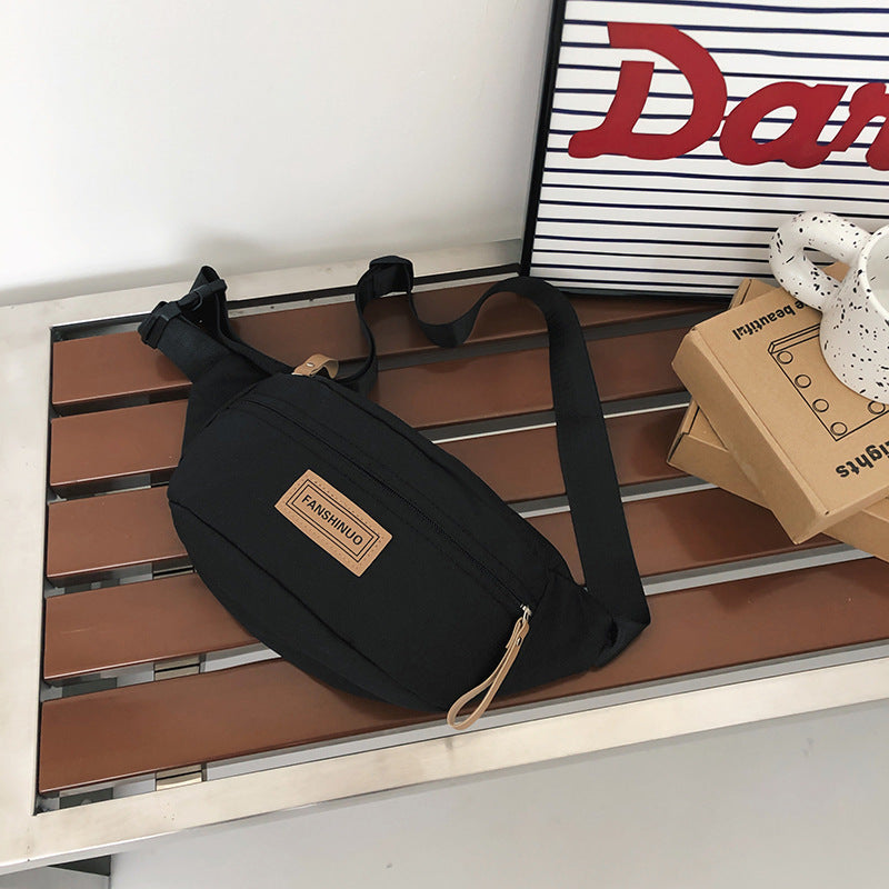 Sleek Multi-Compartment Sling Bag