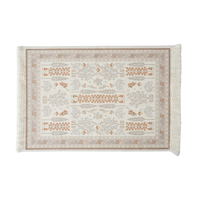 Woven small runner rug in vintage ornamental style with fringes