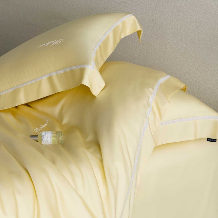 Silky-smooth cotton satin bedding set with fine decorative ribbon and pillowcases