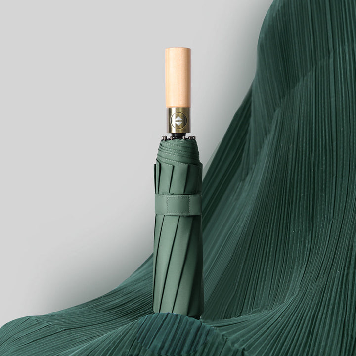 Ladies elegant foldable umbrella with ergonomic wooden handle and wind-resistant construction Kalsten