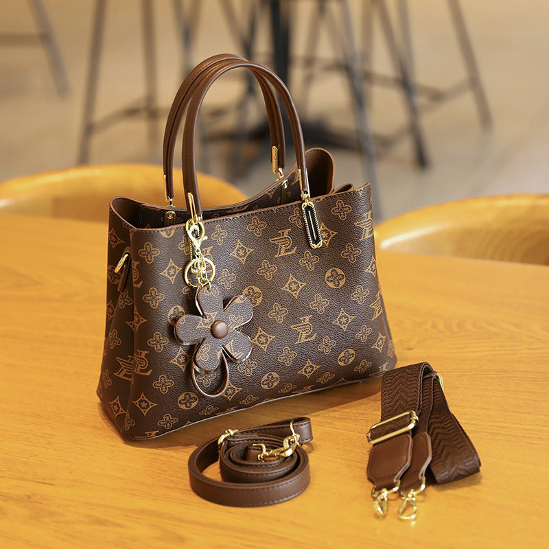 Elegant Handheld Tote Bag with Charming Floral Keychain