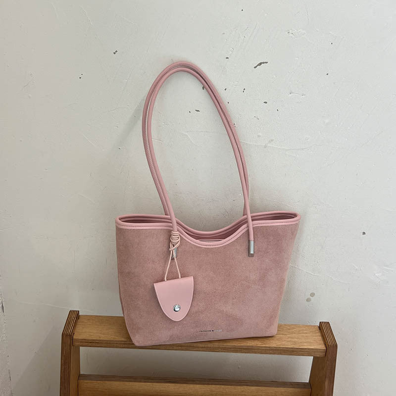 Chic Suede Tote with Decorative Pocket