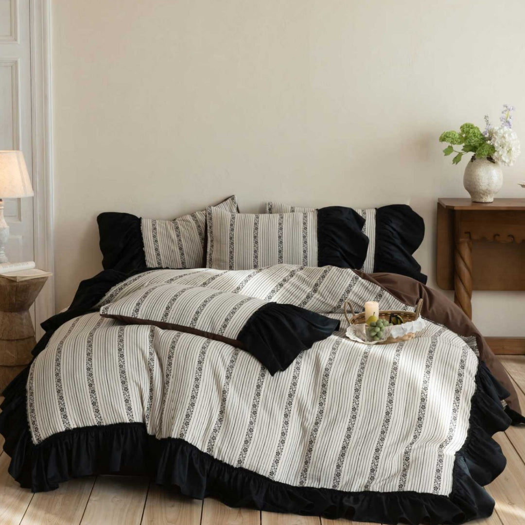 Ruffled duvet cover set with striped jacquard trim and reversible pillow