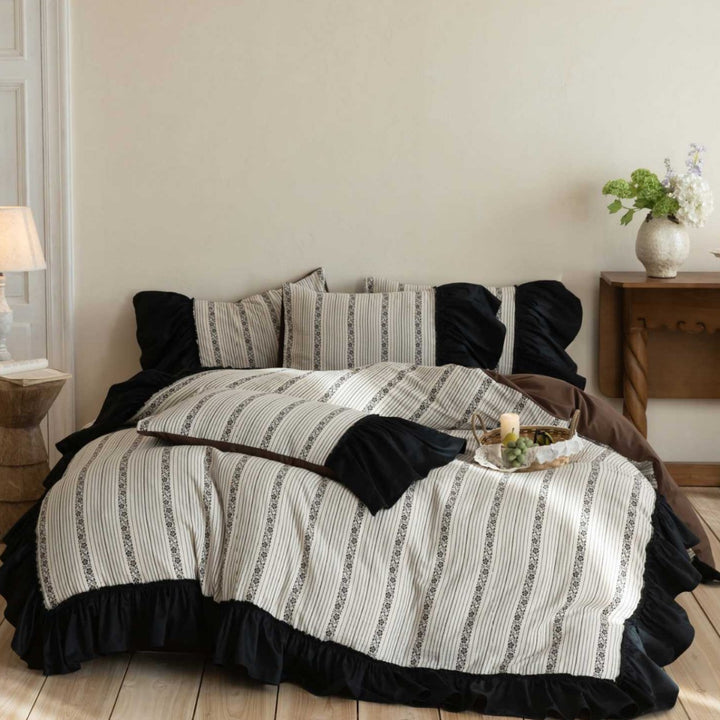 Ruffled duvet cover set with striped jacquard trim and reversible pillow