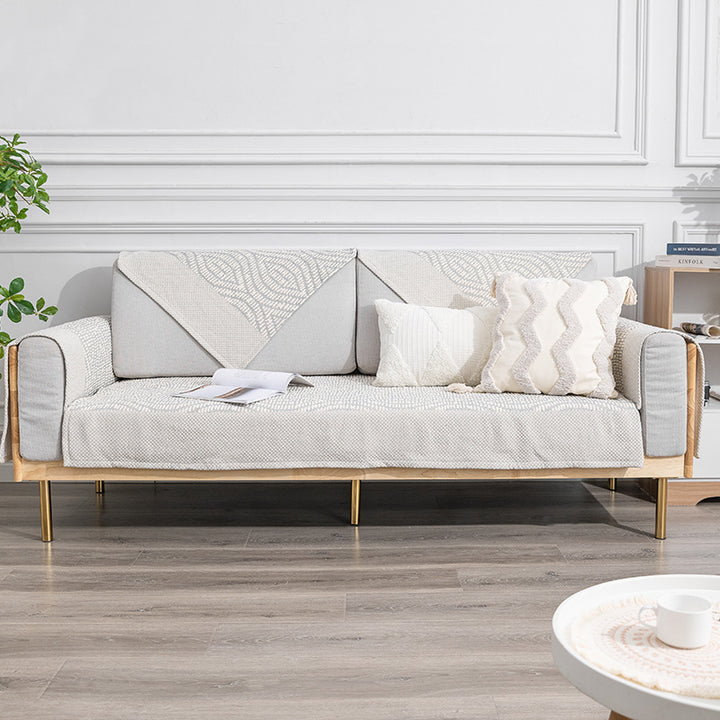 Quilted cover for sofa with armrest protectors and non-slip underside