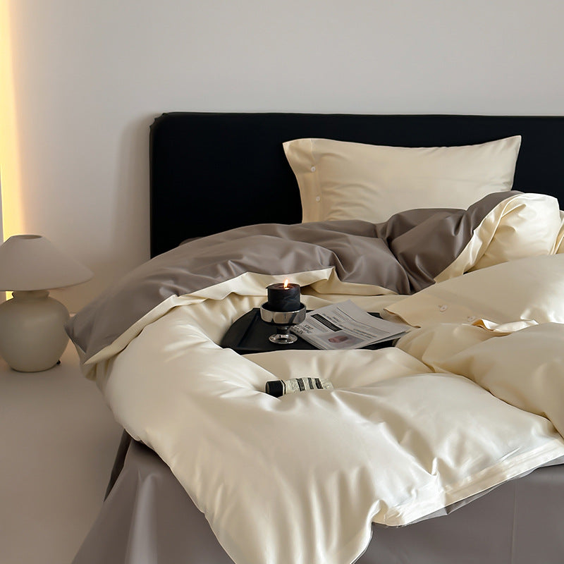 Reversible bedding set made of fine cotton satin with button placket and contrasting back