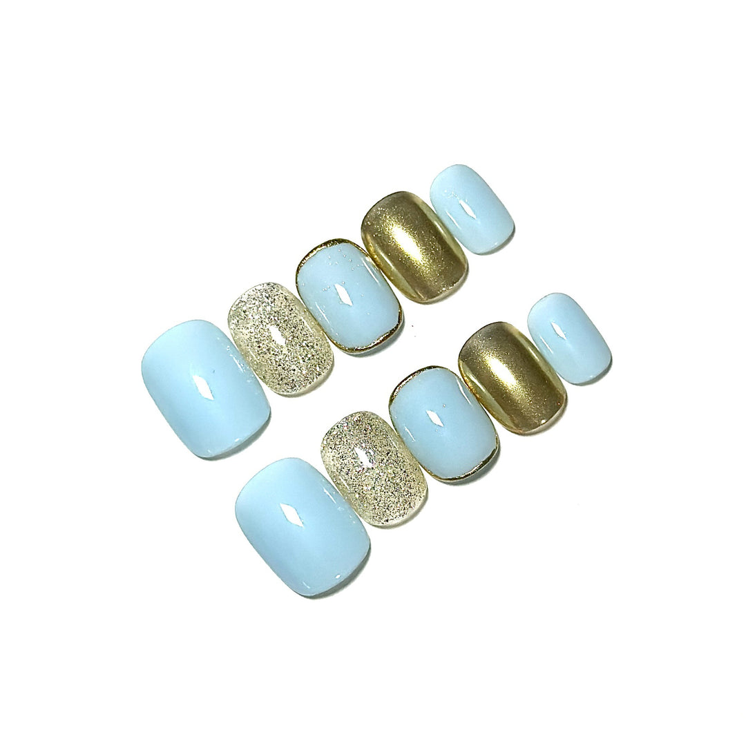 Artistic Press-On Nail Set with Glitter and Metallic Accents