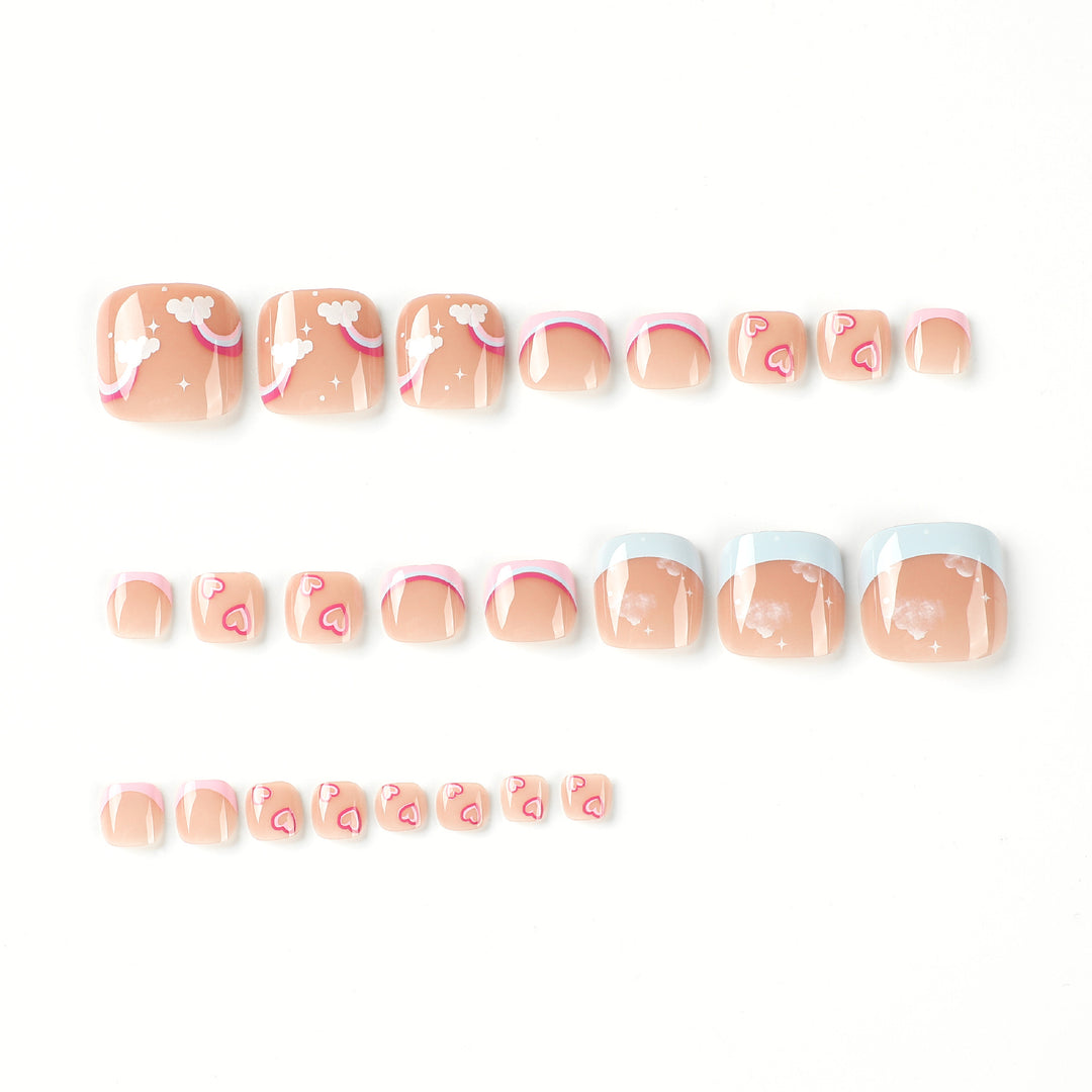 Artful toenail art with heart and cloud motifs Kalsten