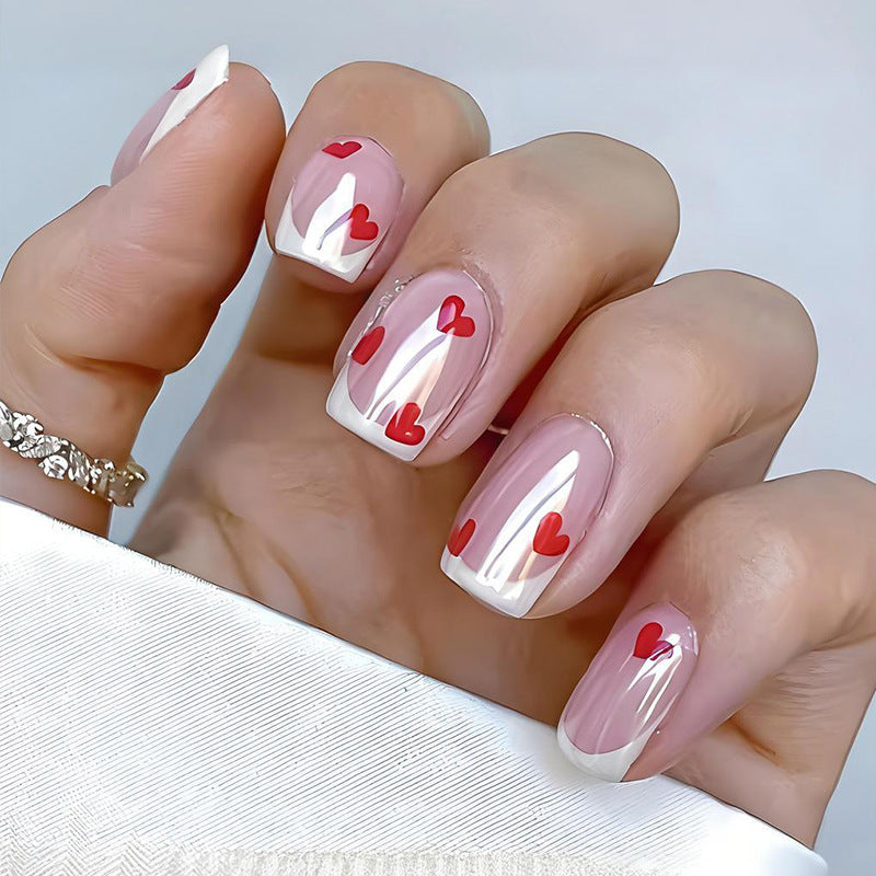 Acrylic nail set with romantic hearts and elegant French tips Kalsten