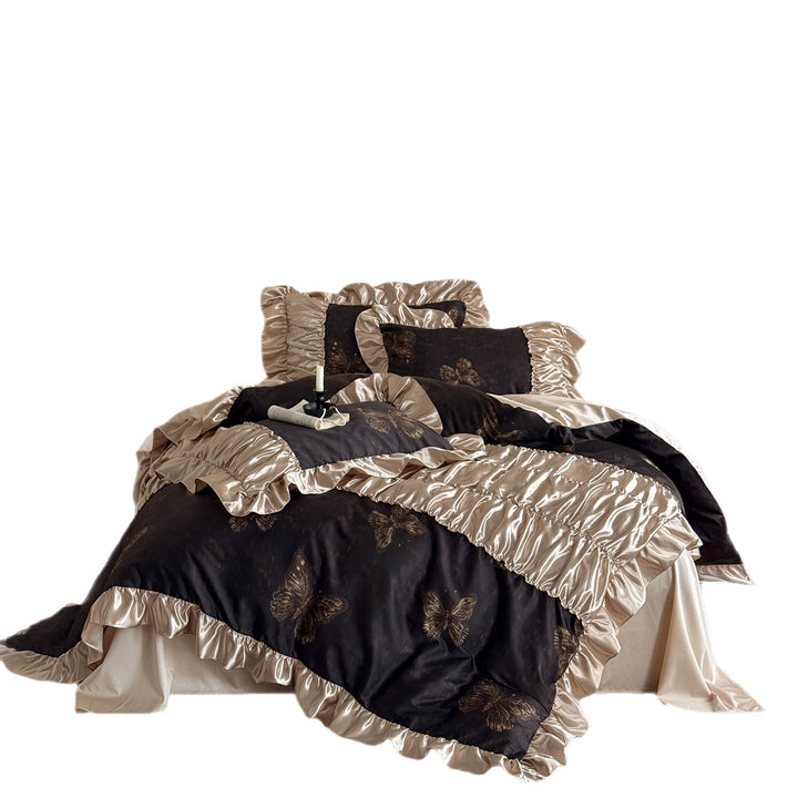 Luxurious satin bedding set with lush ruffles and butterfly print